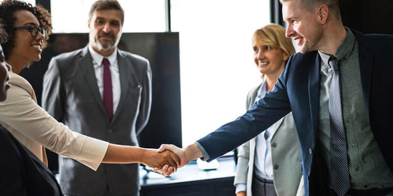 Business meeting with people shaking hands