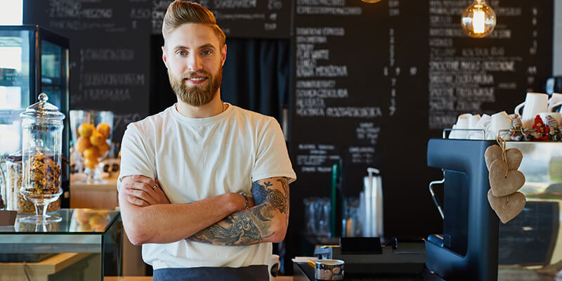 coffee employee with tattoos
