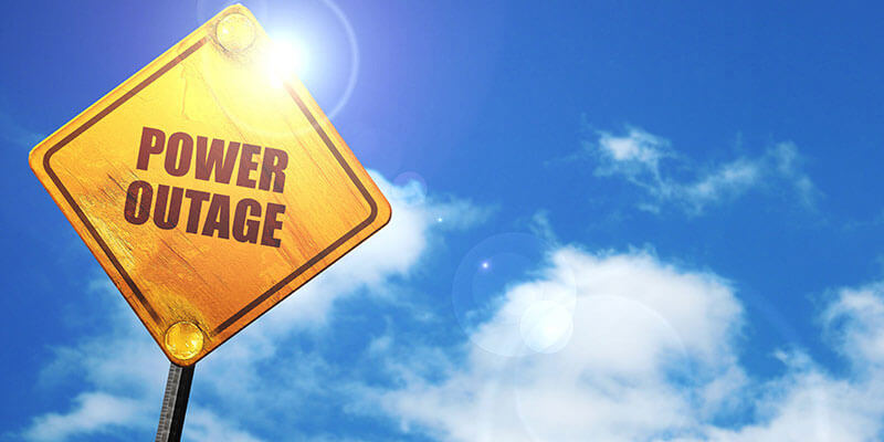 Power Outage street sign, learn how to prepare your business for unexpected weather conditions
